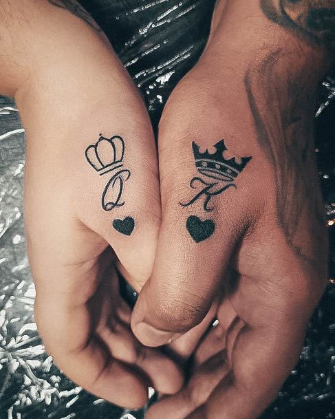 Girl With Stupendous King And Queen Tattoos