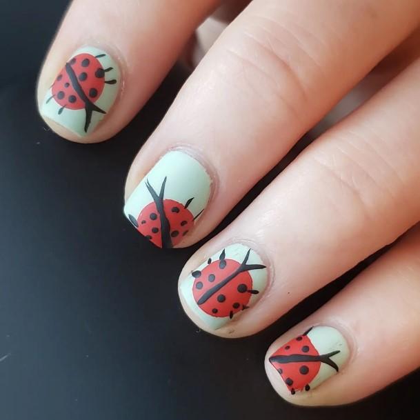 Girl With Stupendous Ladybug Nails