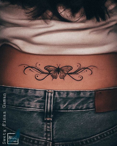 Girl With Stupendous Lower Back Tattoos