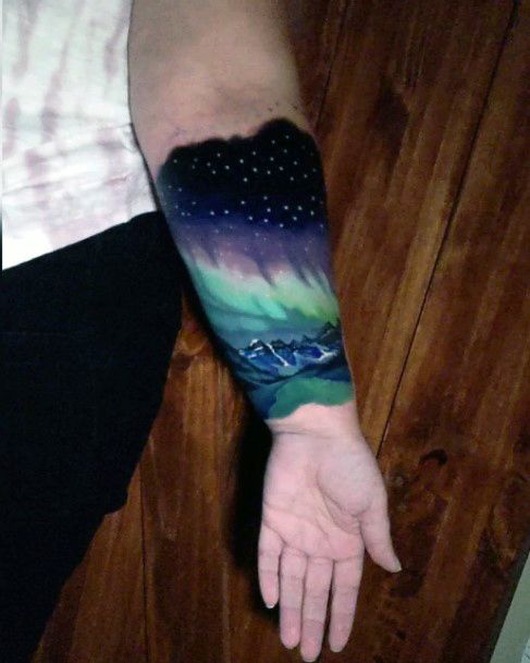 Girl With Stupendous Northern Lights Tattoos