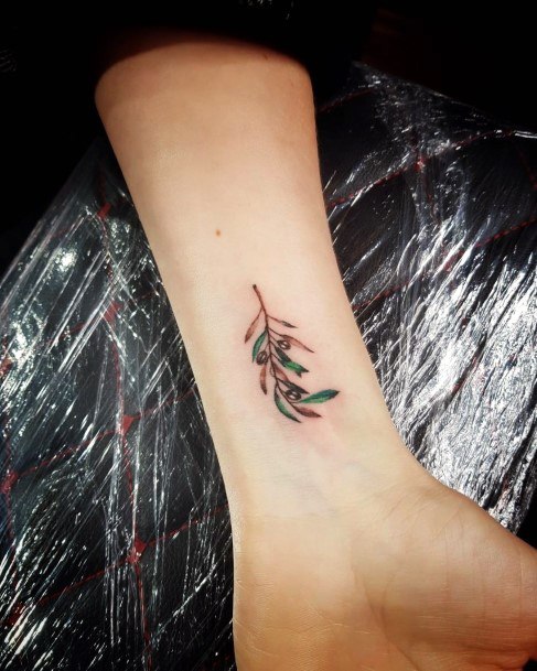 Girl With Stupendous Olive Tree Tattoos