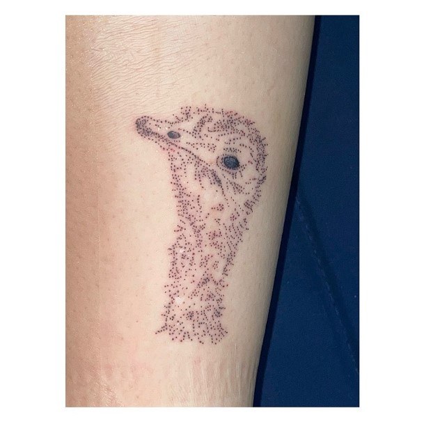 Girl With Stupendous Ostrich Tattoos