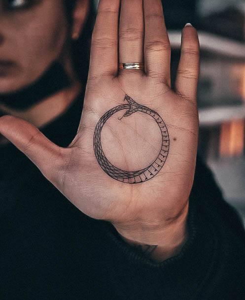 Girl With Stupendous Ouroboros Tattoos