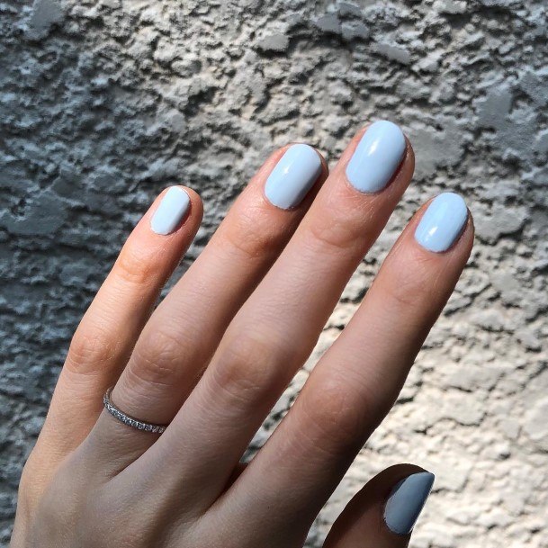 Girl With Stupendous Pale Blue Nails