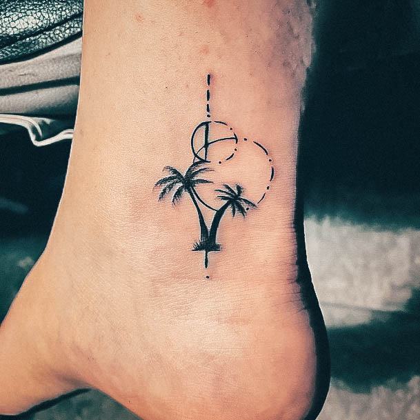 Girl With Stupendous Palm Tree Tattoos Ankle