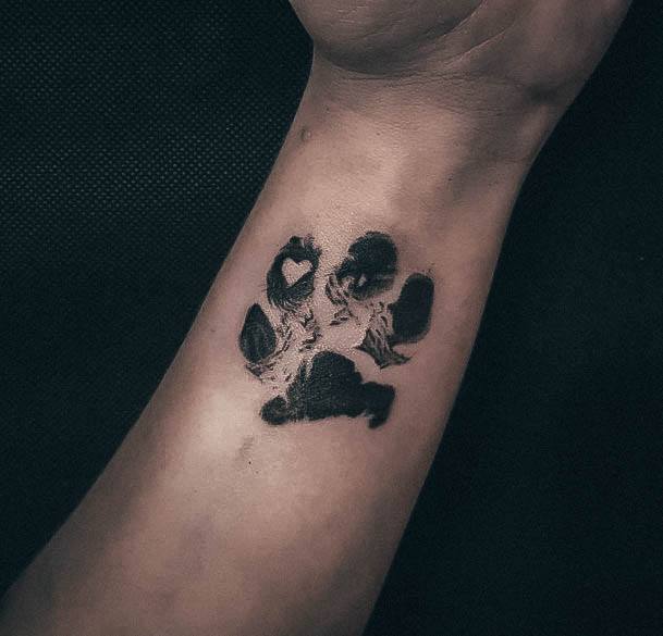 Girl With Stupendous Paw Print Tattoos