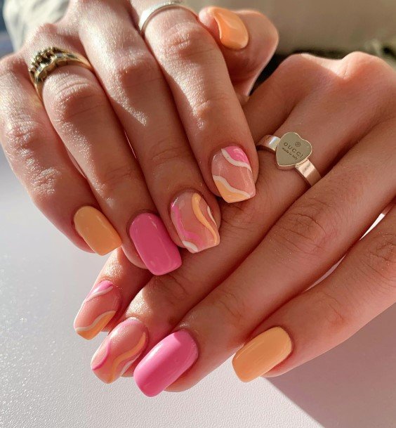 Girl With Stupendous Peach And Pink Nails