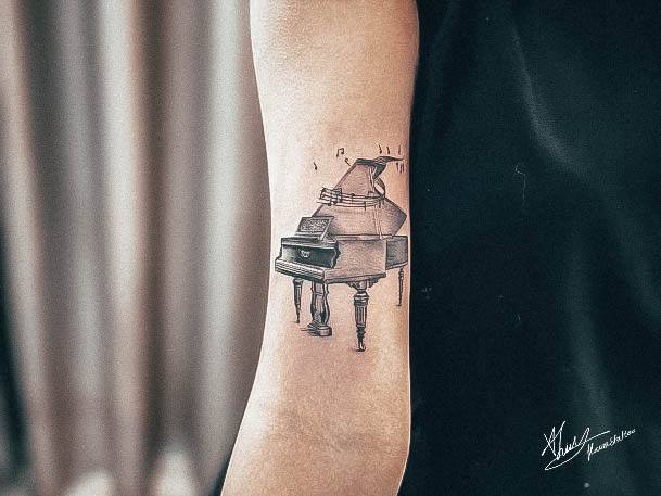 Girl With Stupendous Piano Tattoos