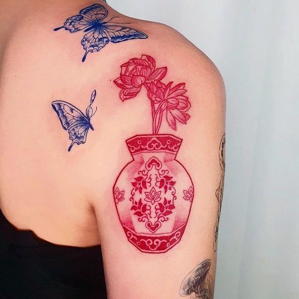 Girl With Stupendous Pottery Tattoos