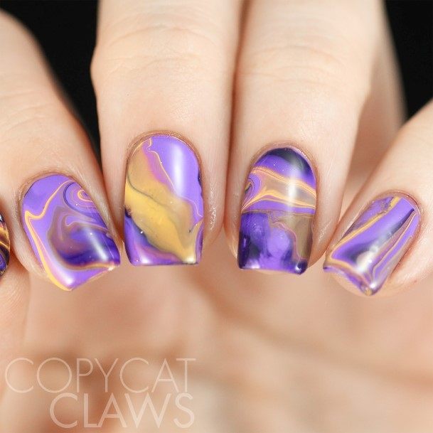 Girl With Stupendous Purple And Yellow Nails