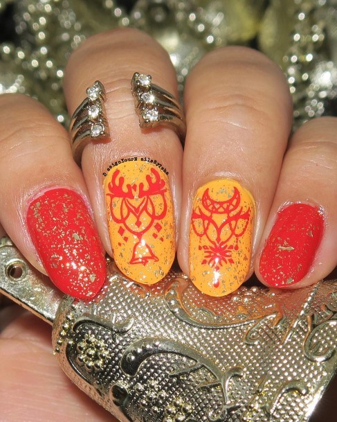 Girl With Stupendous Red And Yellow Nails