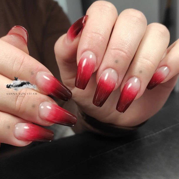 Girl With Stupendous Red Ombre Nails