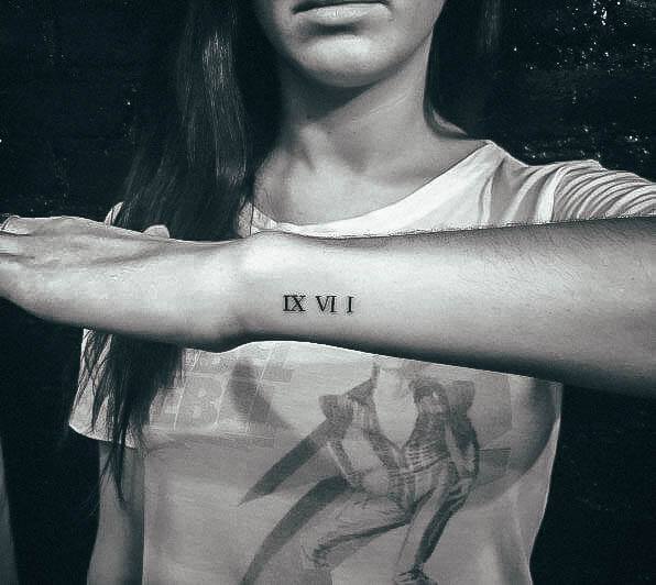 Girl With Stupendous Roman Numeral Tattoos Tiny