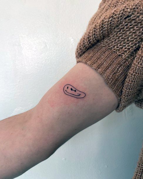 Girl With Stupendous Smiley Face Tattoos