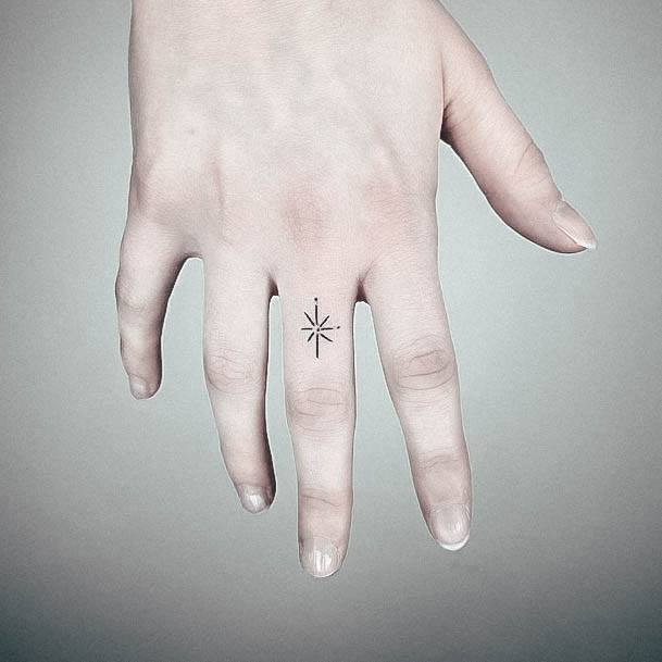 Girl With Stupendous Star Tattoos Finger Hand