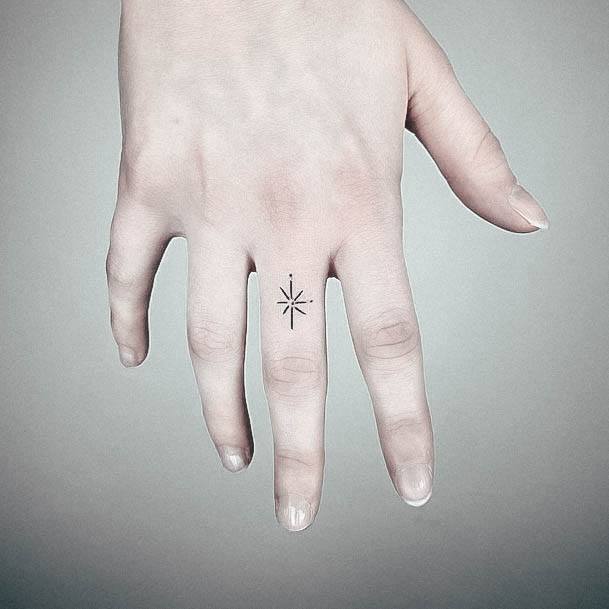 star tattoos on fingers