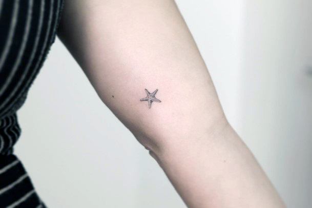 Girl With Stupendous Starfish Tattoos
