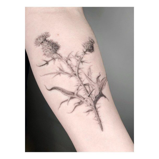 Girl With Stupendous Thistle Tattoos