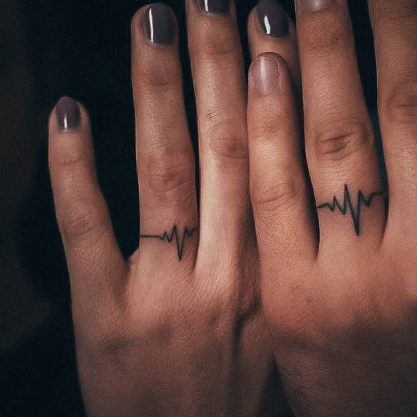 Girl With Stupendous Wedding Ring Tattoos