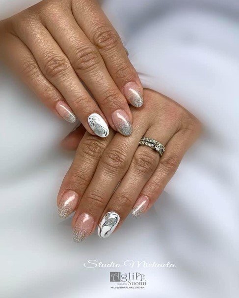 Girl With Stupendous White And Silver Nails