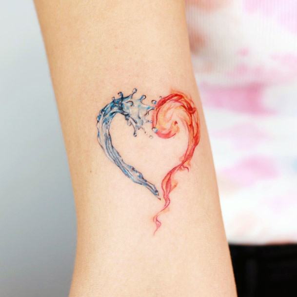 Girls Flaming Heart Tattoo Designs