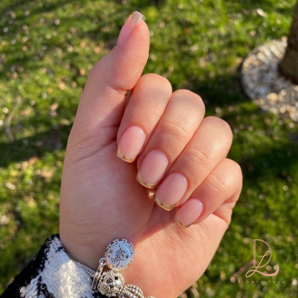 Girls Glamorous Gold French Tip Nail Inspiration