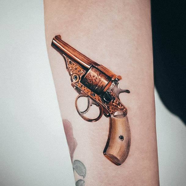 Girls Gun Tattoo Designs