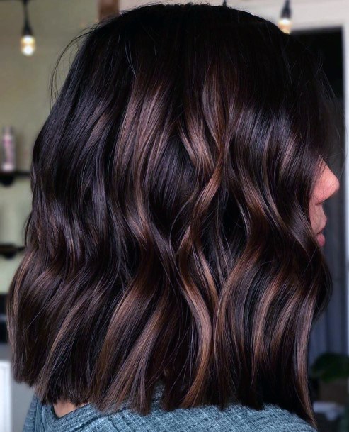 Girls Hairstyles With Trendy Medium Length Wavy Rich Brown Color