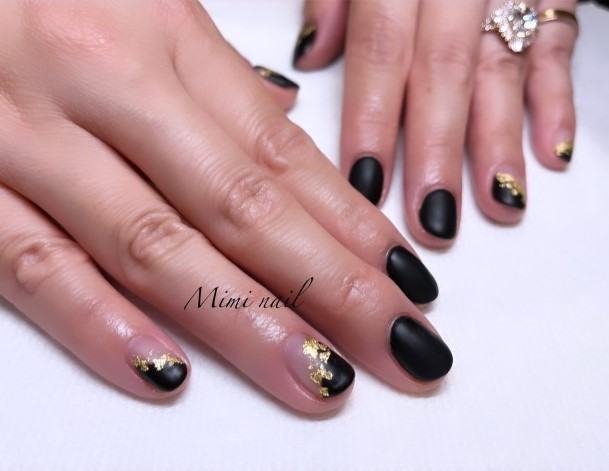 Girls Matte Black And Gold Nail Art Ideas