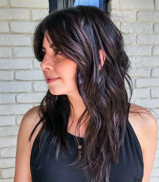 Girls Messy Beach Wave Hairstyle For Long Hair Long Side Bangs