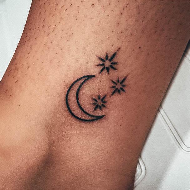 Girls Moon And Stars Tattoo Designs