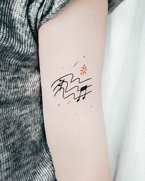 Girls Music Note Tattoo Designs