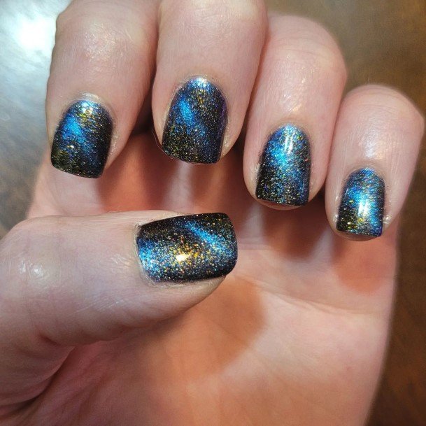 Girls Nails With Blue And Gold