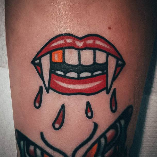 Girls Tattoos With Fangs