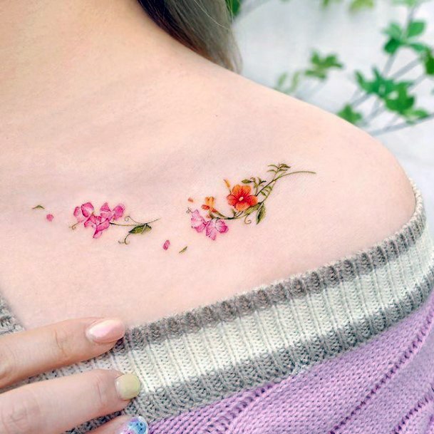 Girls Tattoos With Flower Petal