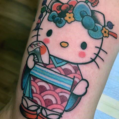 Girls Tattoos With Hello Kitty
