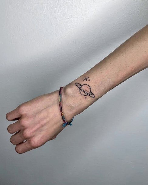 Girls Tattoos With Saturn