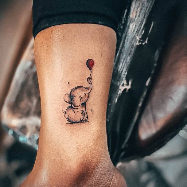 Girls Tattoos With Small Elephant