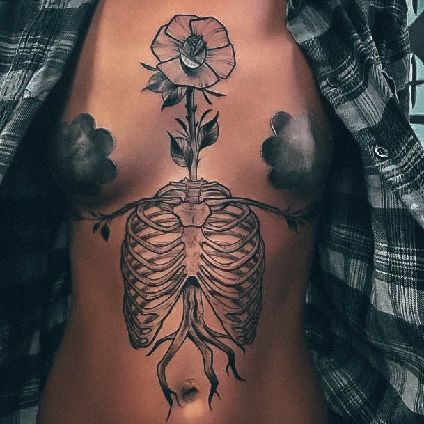 Girls Tattoos With Sternum Skeleton
