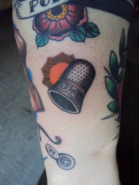 Girls Tattoos With Thimble