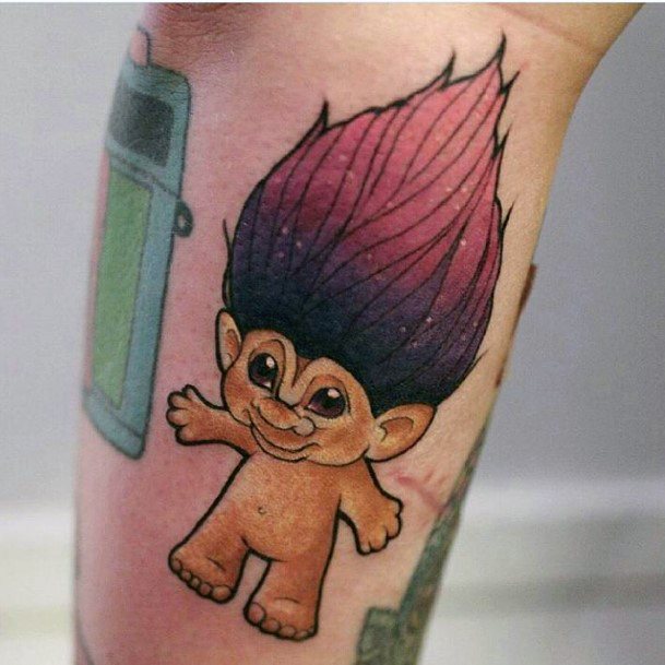 Girls Tattoos With Troll Doll