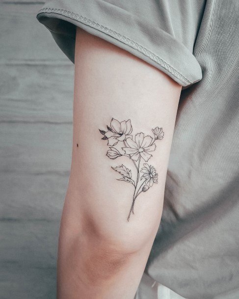 Girly Daisy Tricep Tattoo Ideas