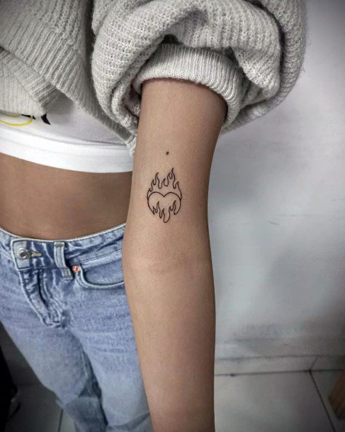 Girly Flaming Heart Tattoo Ideas