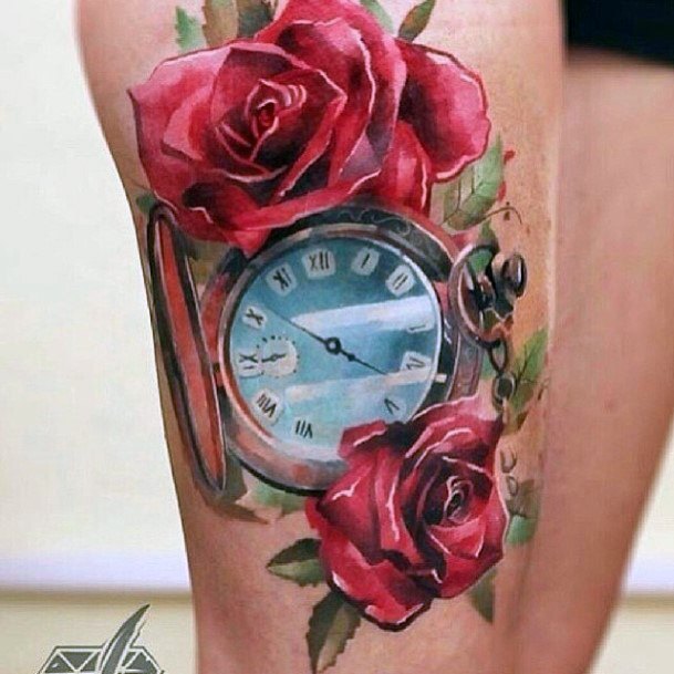 Glassy Time Piece And Floral Tattoo Womens Thighs