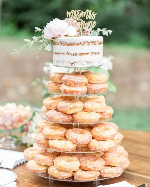 Glazed White Donuts And Wedding Cake