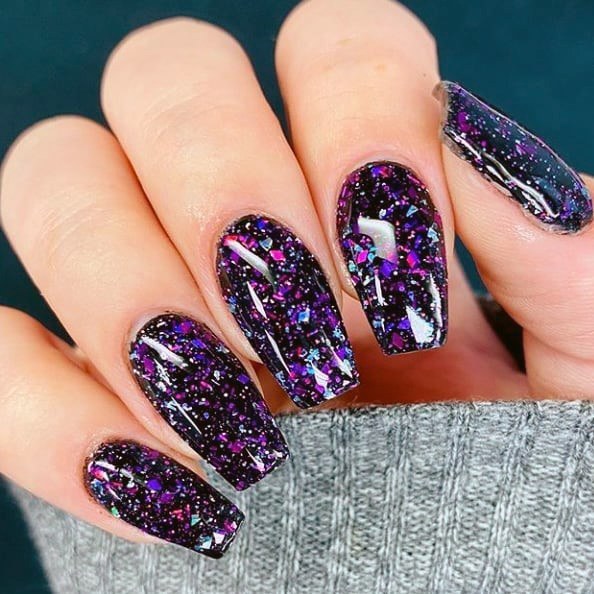 Gleaming Purple Marble Texture On Nails For Women