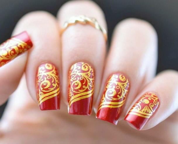 Glistening Gold And Red Nails Women