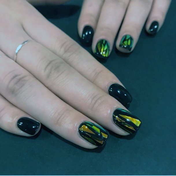 Glistening Gold On Black Nails Women