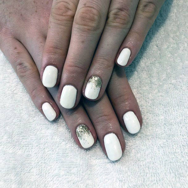 Glistening Golden Sparkles On White Gel Nails Women