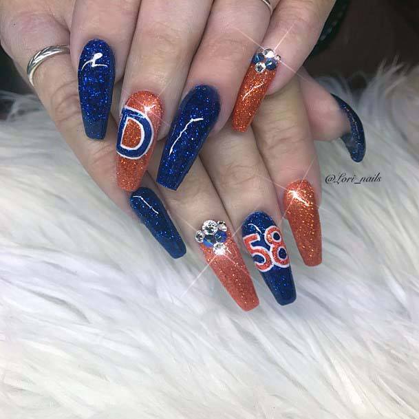 Glistening Navy Blue And Orange Sport Nails For Women